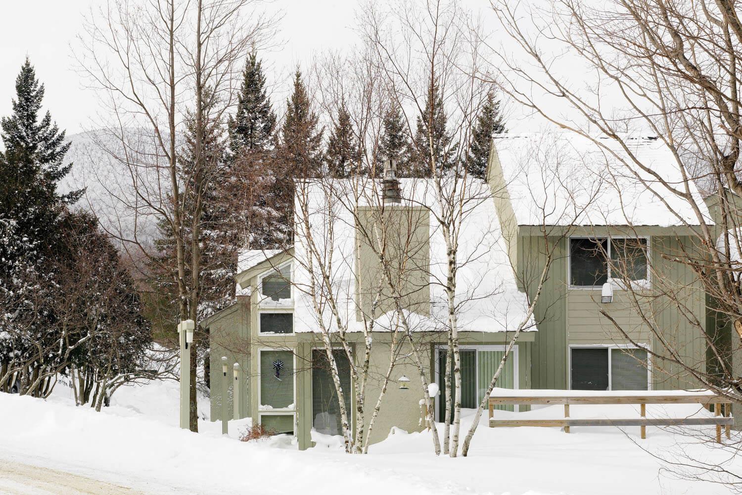 Winter photo of ski resort lodging, trailside condos at Jay Peak.